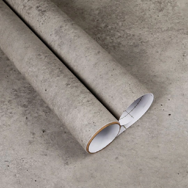 A roll of light gray concrete or stone-textured vinyl wrap.