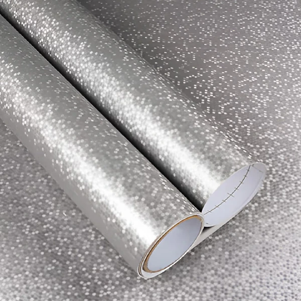 A roll of shiny silver glitter vinyl wrap.