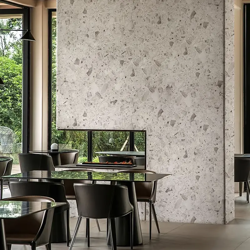 Gray and white terrazzo pattern vinyl wall wrapping in a restaurant.