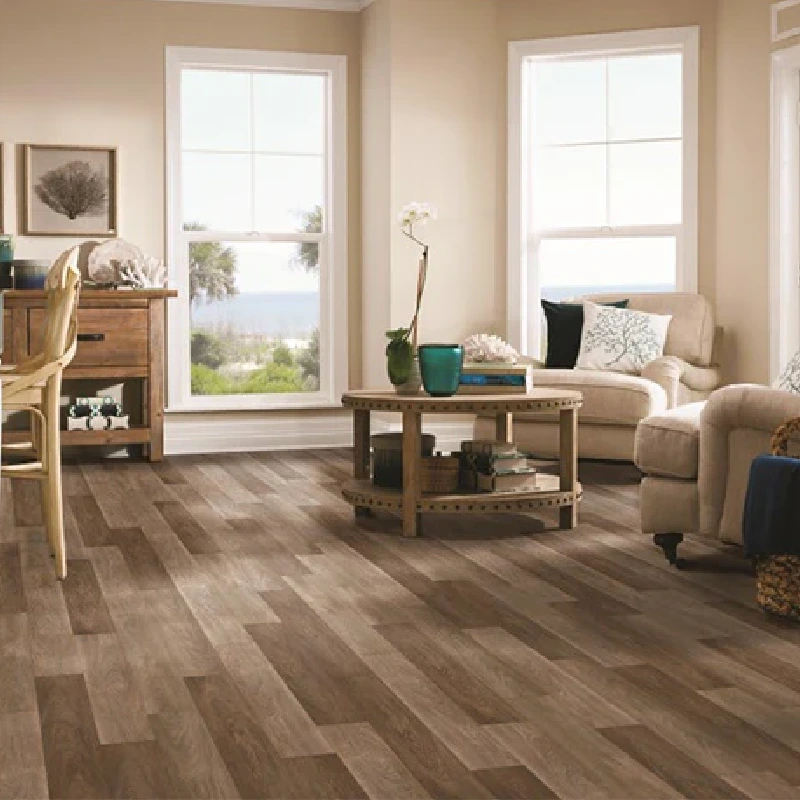 Luxury vinyl tile flooring with a weathered wood grain pattern