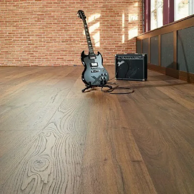 Luxury vinyl tile flooring with a wood grain pattern, featuring an electric guitar
