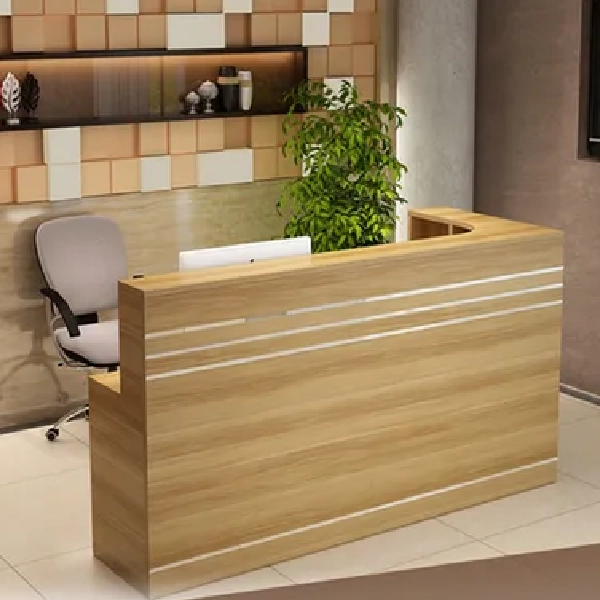 Natural wood grain vinyl wrap on a reception desk in an office or restaurant.