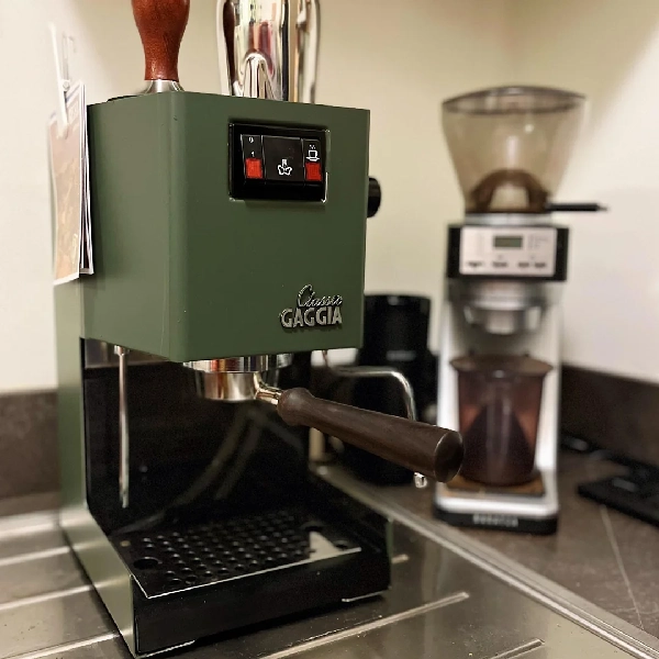 Olive green appliance vinyl wrap on a coffee machine.