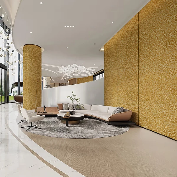 Yellow mosaic tile vinyl wrap on a curved wall and pillar in a modern lobby.