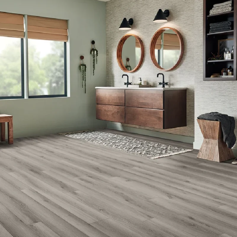 bathroom with a grey, wide-plank vinyl floor wrap with a faded wood grain texture.