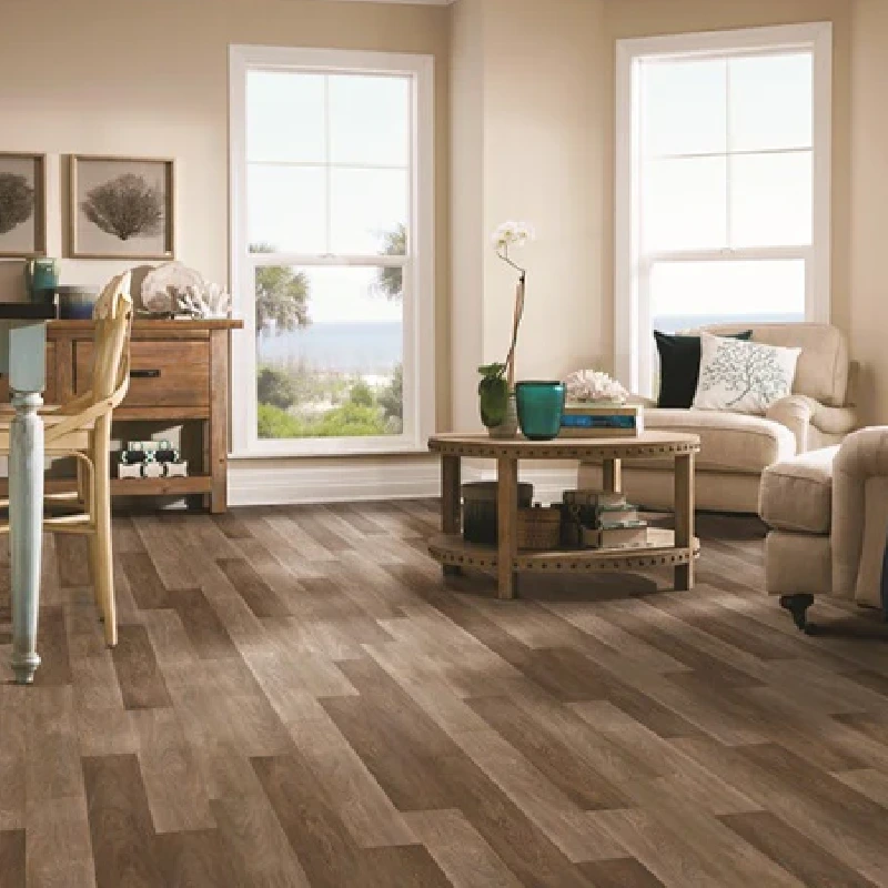 living room with a brown, multi-toned vinyl floor wrap with a faded wood plank