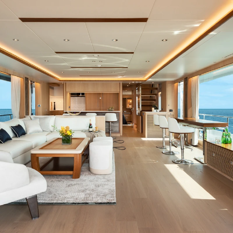 modern yacht interior with light wood-look yacht wrapping on the floors, walls, and bar area