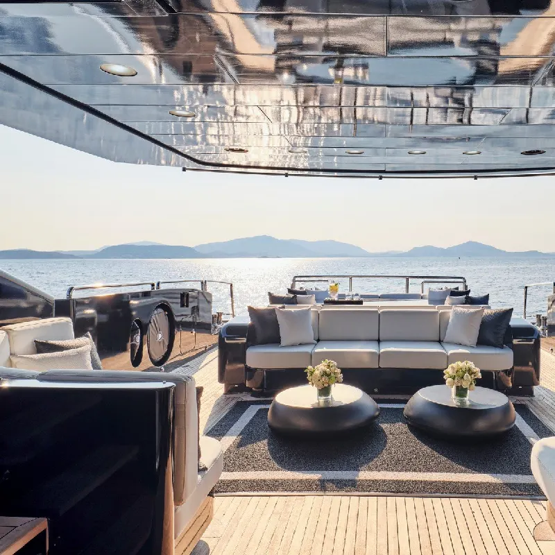 modern yacht with a dark reflective vinyl wrap on the furniture and overhead panel