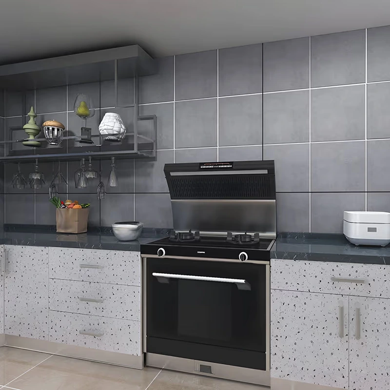speckled white vinyl wrap on the countertop and lower cabinets.